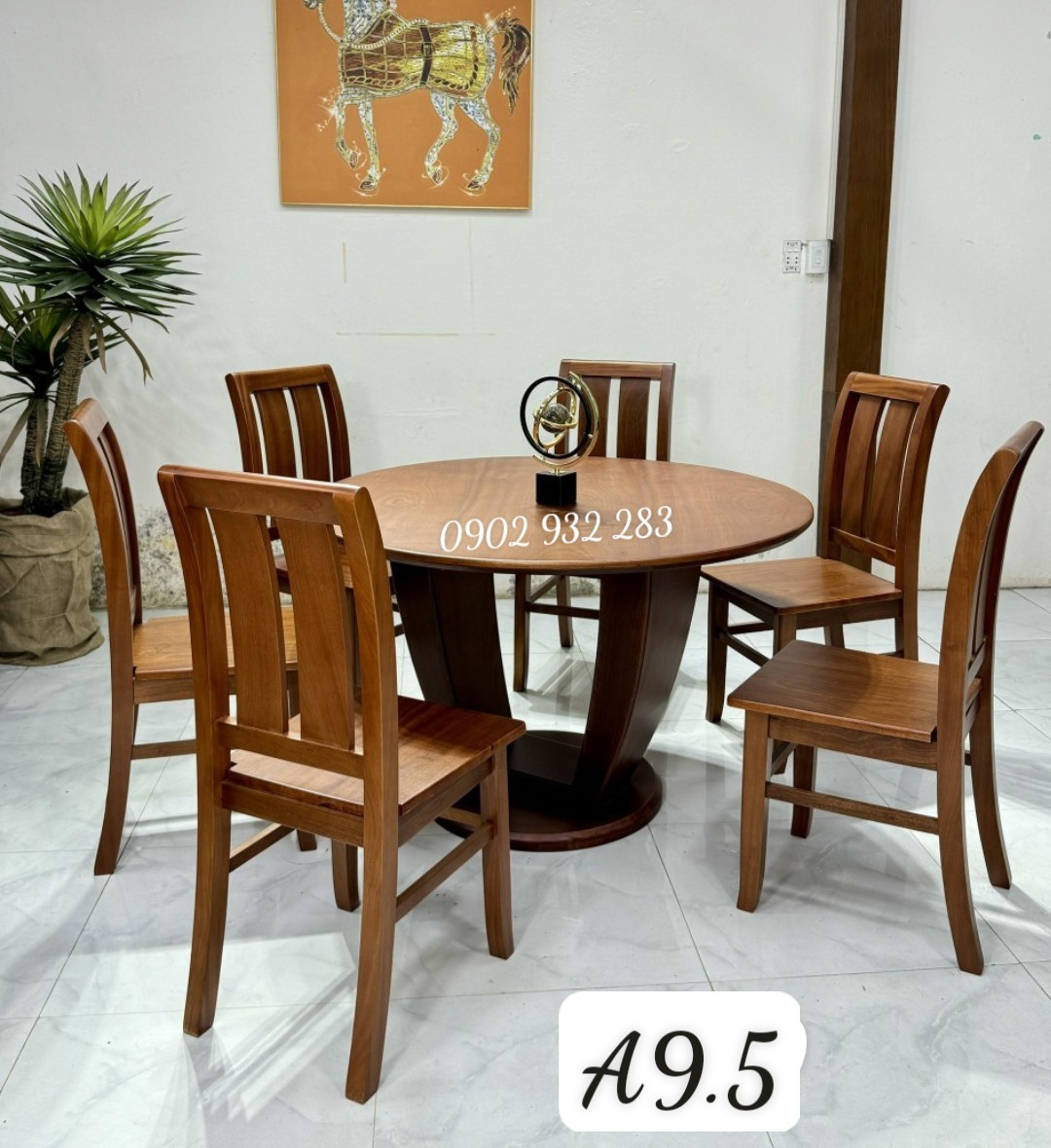 Bộ bàn ăn gỗ xoan đào bàn tròn ghế 4 lan cong A9.5